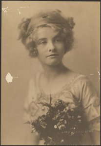 Portrait of a Woman Holding Bouquet with Fern by Louis Fleckenstein