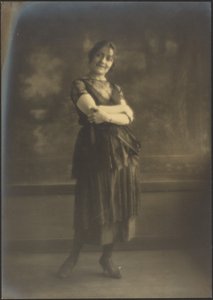 Portrait of a Woman Standing Before Tapestry by Louis Fleckenstein