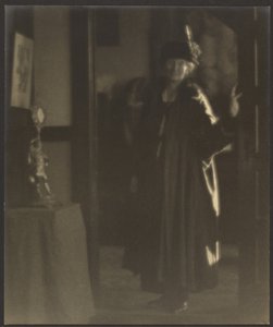 Portrait of a Woman in Doorway