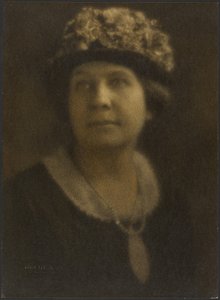Portrait of a Woman in Floral Hat