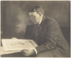 Self-Portrait in Studio Contemplating a Photograph of a Young Girl by Louis Fleckenstein