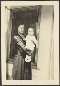 Woman Holding Smiling Baby by Louis Fleckenstein