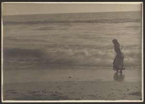 Woman Walking in the Beach Surf by Louis Fleckenstein