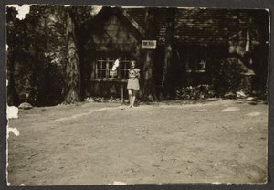 Woman before Cabin by Louis Fleckenstein