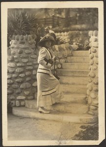 Woman with Camera on Steps