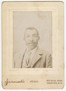Photograph of a man wearing a light colored jacket, vest and necktie, late 19th century by Louis Janousek