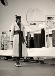 Model in an overcoat created by the couture house "Lamma" by Luis Bogino