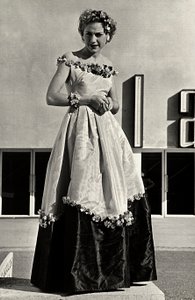 Model in ball gown created by the couture house Graldi by Luis Bogino