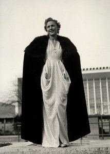 Model in evening dress, a creation of the couture house "Graldi" by Luis Bogino