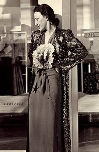 Model in evening dress created by the Italian couture house Dragoni by Luis Bogino