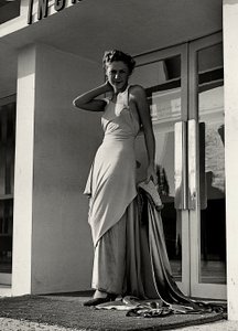 Model in evening dress created by the couture house "Graldi" by Luis Bogino