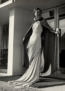Model in evening dress created by the couture house Graldi by Luis Bogino