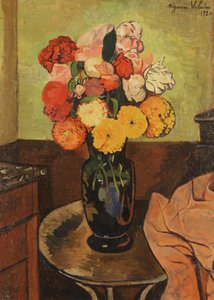 Vase of Flowers on a Round Table