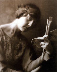 Half-length portrait of the painter Elisabeth Chaplin. She is holding two brushes and a palette in her left hand by Mario Nunes Vais