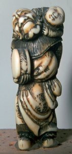 Japanese Netsuke of a Chinese dancer and child, 18th century by Masahira