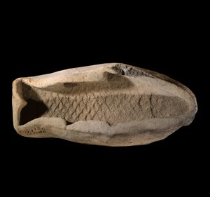 Terracotta Mold in the Shape of Fish by Mesopotamian