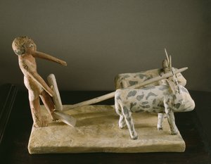 Funerary model of a ploughman leading his plough drawn by two oxen