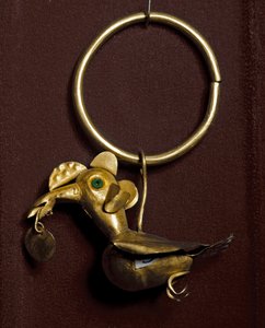 Precolombian art, Mochica culture: earring with bird in gold. 200-500 AD by Moche Moche