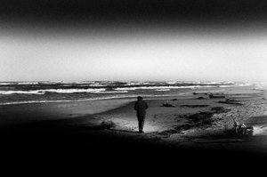 Solitary Beach Walk by Monika Zemojtel