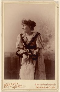 Unidentified Woman in Profile with Feather Fan by Murdock and Company