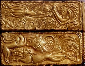 Lion hunting deer in a forest (detail)