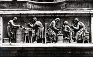 Relief depicting artists and craftsmen at work