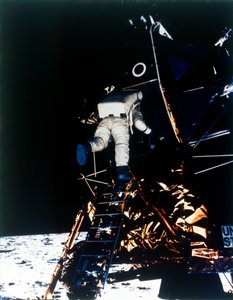 Buzz Aldrin descends from the Lunar Module, Apollo II mission by Neil Armstrong