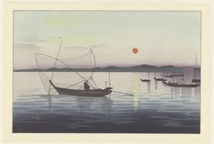 Fishing boats at sunset