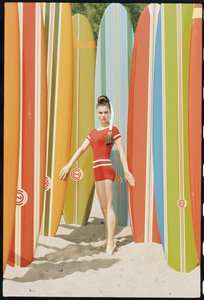 Actress Wende Wagner with surfboards on the beach in Malibu