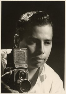 Orlando Suero portrait with Rolleiflex camera by Orlando Suero