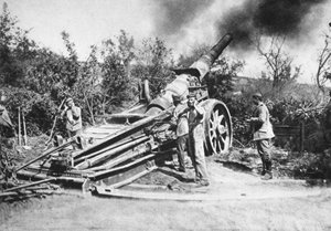 German Soldiers Firing a Heavy Cannon