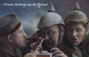 German Soldiers Receiving a Parcel of Cigars from Home by Photographer German