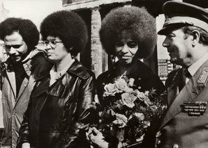 Angela Davis welcomed by soldiers of the National People