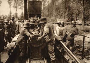 The 38cm Grenade is loaded into its tube by Photographer German
