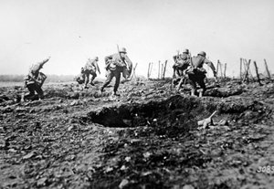 WWI German stormtroopers advance at Sedan with bags of grenades slung round their necks, Western Front