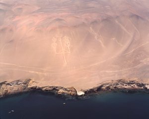 Aerial view of the Paracas Candelabra or the Candelabra of the Andes, at Pisco Bay