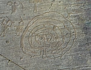 Prehistory, Camunni civilization, rock art: a grave rock of the representation of warriors weapons of shields and swords, and a maze. Period between the Neolithic and the Bronze Age. Capo di Ponte, Parco nazionale delle incisioni rupestri di Naquane, Valca by Prehistoric Prehistoric