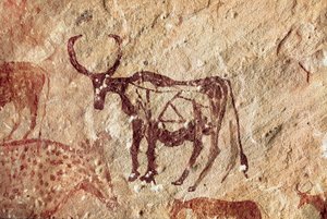 Rock painting: representation of a cervid. Cave of Tadrart Acacus Libya by Prehistoric Prehistoric