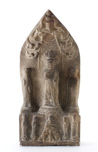 Buddhist trinity in relief on lotus pedestals before pointed background
