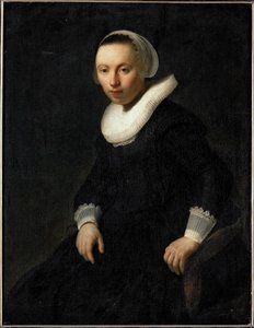 Young Woman Sitting in a Chair by Rembrandt Harmensz. van Rijn
