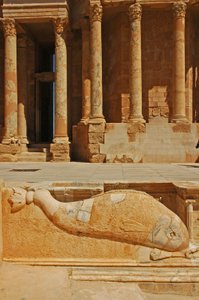 Dolphin carving in front of stage, Sabratha, Libya, c.190 AD