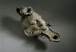 Roman Art: Bronze Oil Lamp in the Shape of a Face