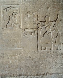 Egyptian antiquity: relief in limestone of Hormin: Sethi I distributes the collars of valour as a reward for his courage to Hormin, head of the king