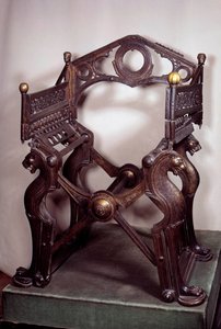 Merovingian art: armchair or throne by Dagobert I. Made in golden bronze in the 7th-9th century. From the treasure of the abbey of Saint-Denis. Paris, B.N. by School Merovingian