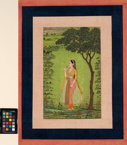 A woman standing by a tree, holding a flower by School Mughal