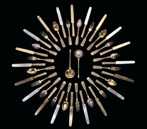A silver-gilt and niello flatware service