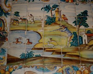 Azulejos tiles depicting a hunter shooting deer