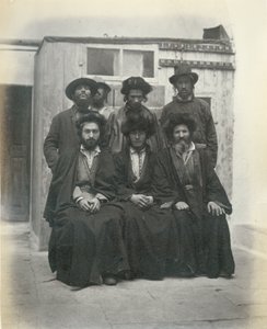 Group of 7 Polish Jews in the Courtyard of the Mediterranean Hotel, Jerusalem by Sergeant Henry Phillips