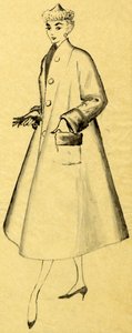 Woman in duster coat and pointed hat by Shirley Markham
