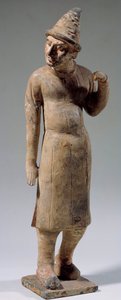 Chinese art: Sogdian, barbarian terracotta statuette with pointed hat carrying silk by Sogdian Sogdian